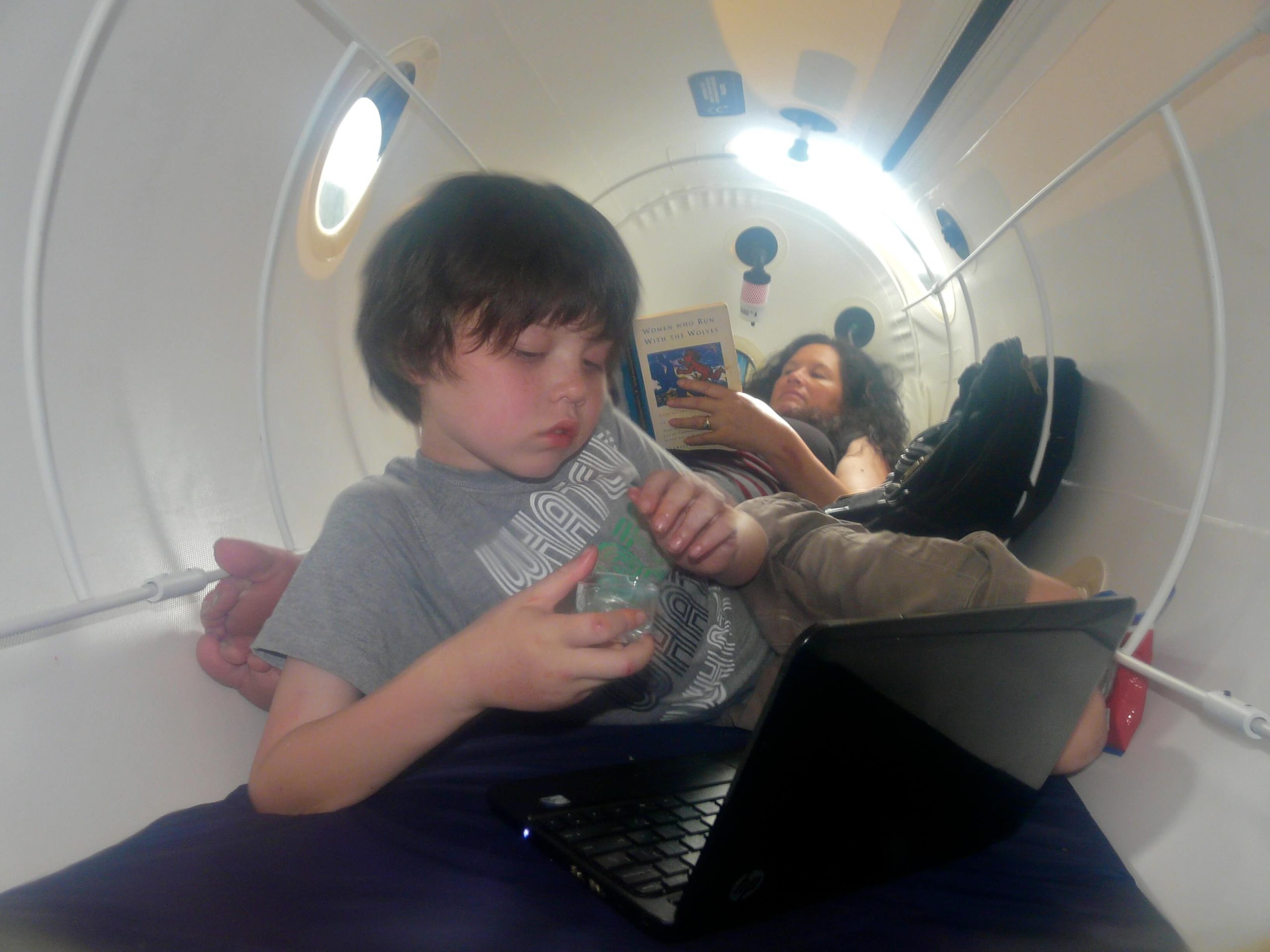 Autistic child in mild hyperbaric oxygen chamber to recover from autism